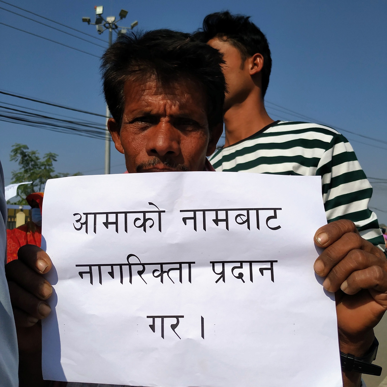 Stateless youths stage a protest rally from Ghantaghar Chowk to Parsa District Administration Office in Birgunj, demanding citizenship in name of mother in August 2021