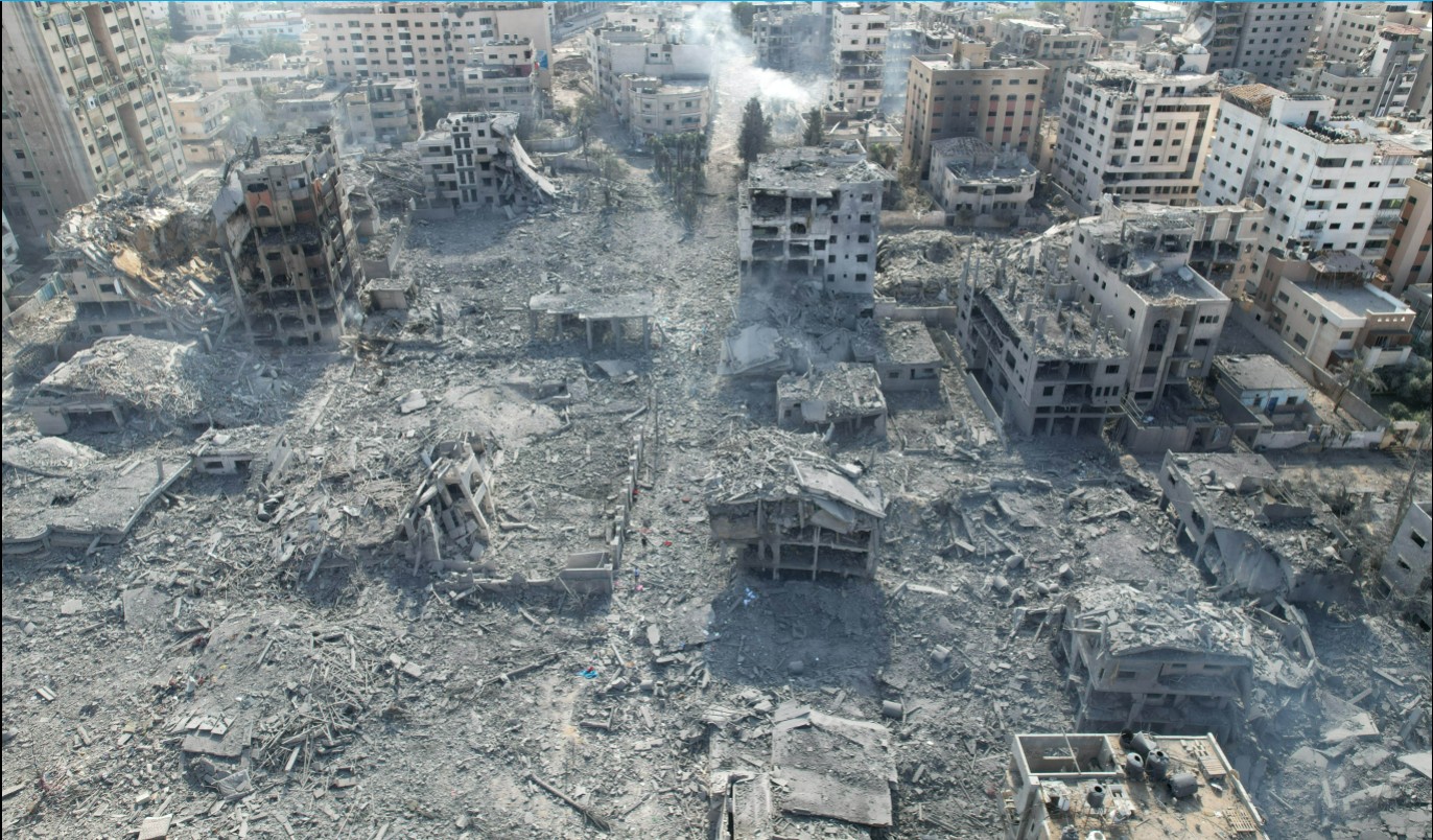 October 2023, aerial view of collapsed buildings and destruction in the Gaza Strip | © UNRWA Photo by Ashraf Amra
