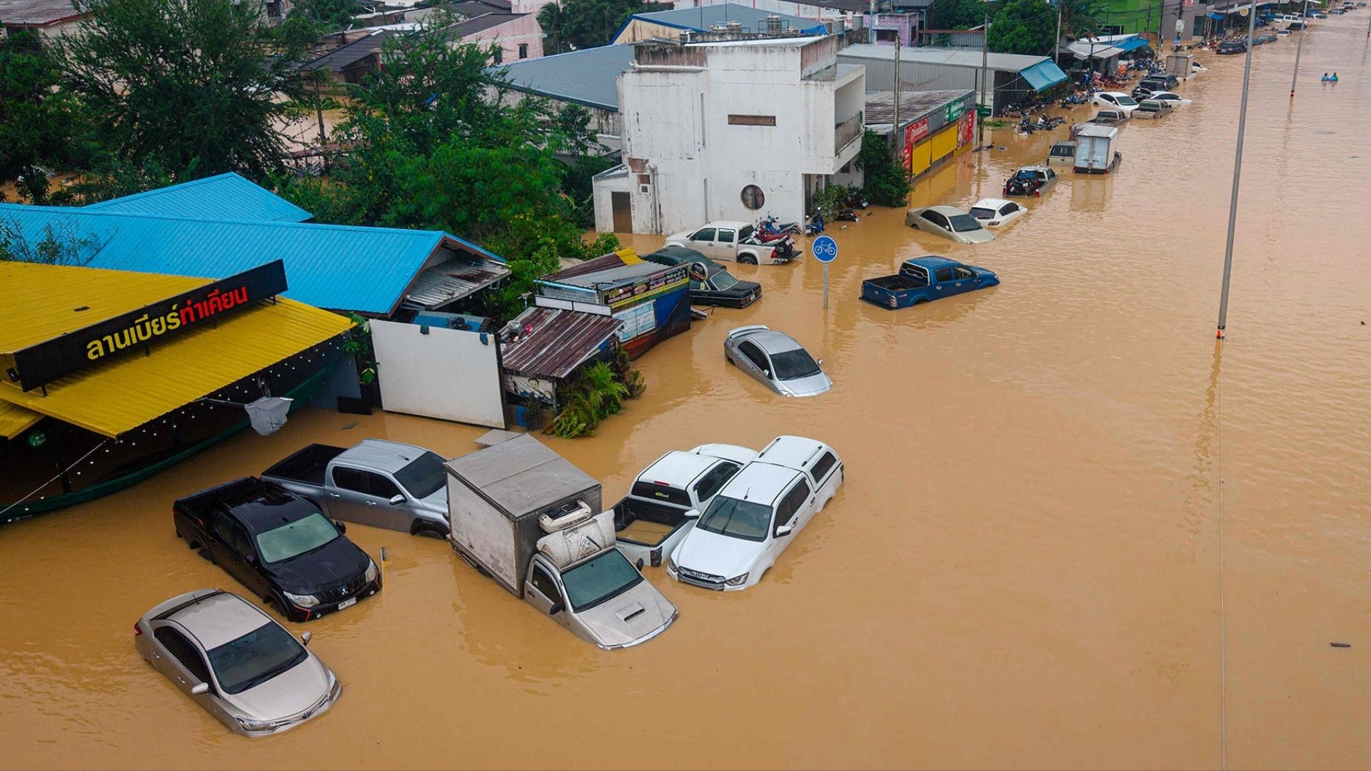 An aerial photo taken on November 26, 2025 showing flood waters submerging vehicles in Hat Yai in Thailand's southern Songkhla province | Photo: Arnun Chonmahatrakool/THAI NEWS PIX/AFP